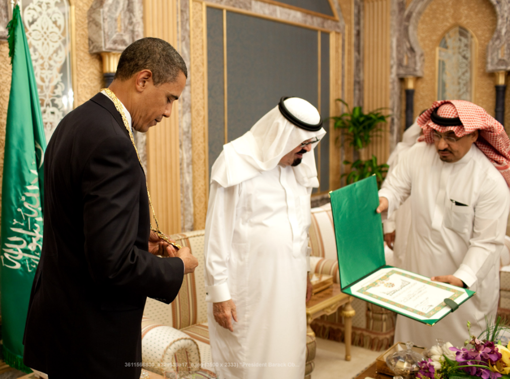 Obama receiving Saudi Arabia's Order of Merit from the late Saudi King Abdullah Aziz at the start of their bilateral meeting in Riyadh, June 2009. Official White House photo by Pete Souza